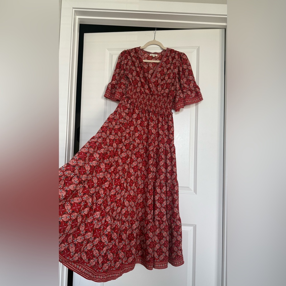Max Studios red patterned dress with draped sleeves. Worn only once.